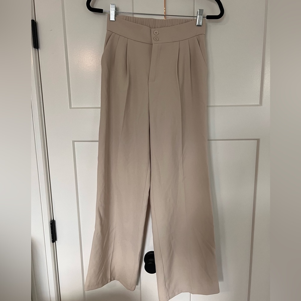 Bone colored slightly wide leg trouser pants with stretch waistband